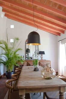 The dining room faces south with views over the Mediterranean Sea