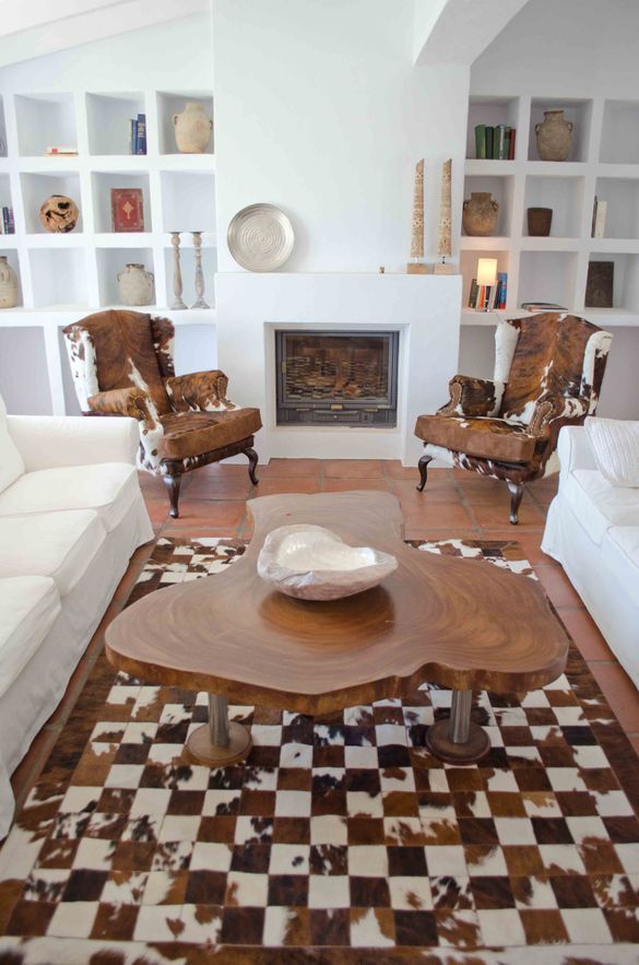 The Hunting Lodge theme is carried across with bespoke animal skin furnishings