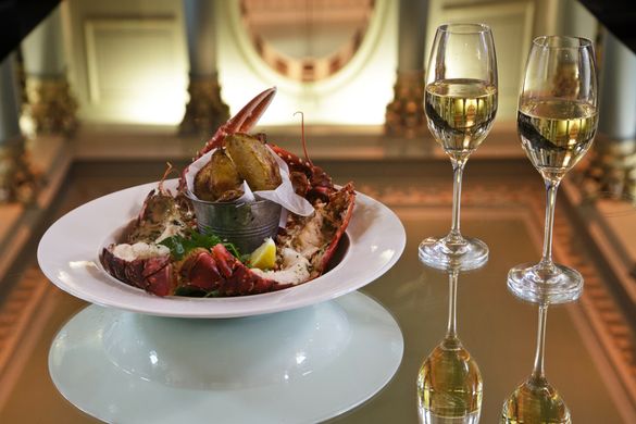 A glass of chilled Pommery and a plate of lobster