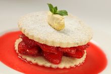 Redcurrant soaked strawberries with black pepper biscuits
