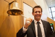 Mantra Group CEO Bob East rings the ASX bell to commence trading