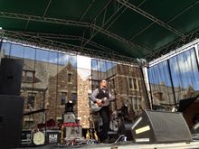 Elliott BROOD on stage at the 2014 'Performance in the Park', Banff National Park