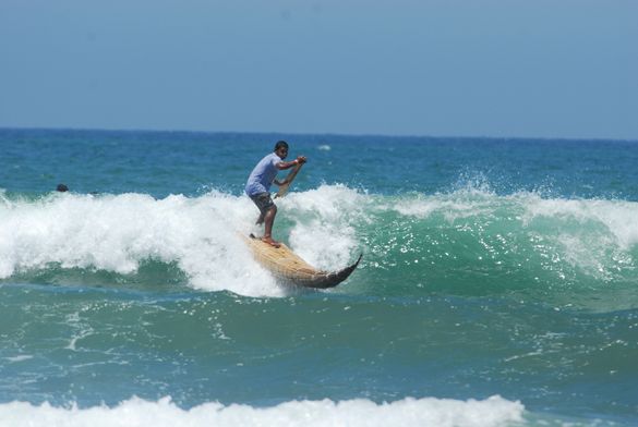 Surfing on the tradidional Caballitos de Totora in Peru's Huanchaco