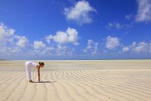 Beach yoga, Vamizi Lodge, Aardvark Safaris 