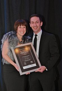 General Manager Todd Handy and Conference & Events Manager Dion Bisa hold the Award for Best Suite/Apartment Hotel (Accommodatio