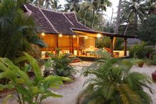 A cottage at A Beach Symphony resort at Mararikulum Beach