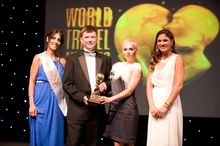 Chris Watkins of Real Russia accepts the company's award