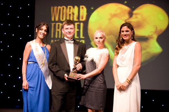 Chris Watkins of Real Russia accepts the company's award