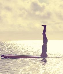 Sunrise Yoga Paddle Boarding at Raffles Praslin, Seychelles