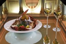 A glass of chilled Pommery and a plate of lobster