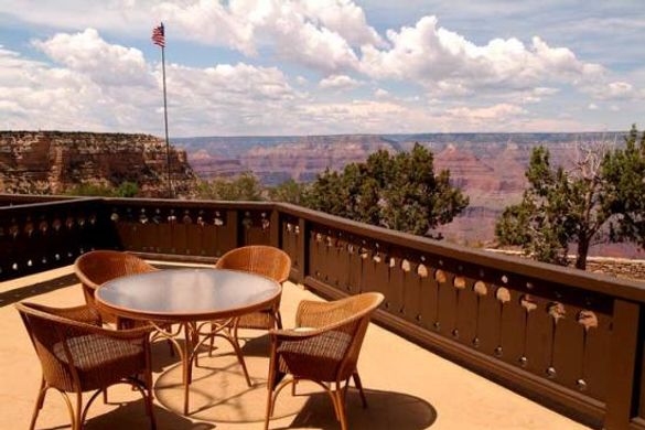 Travelers enjoy the view from the South Rim of Grand Canyon National Park.