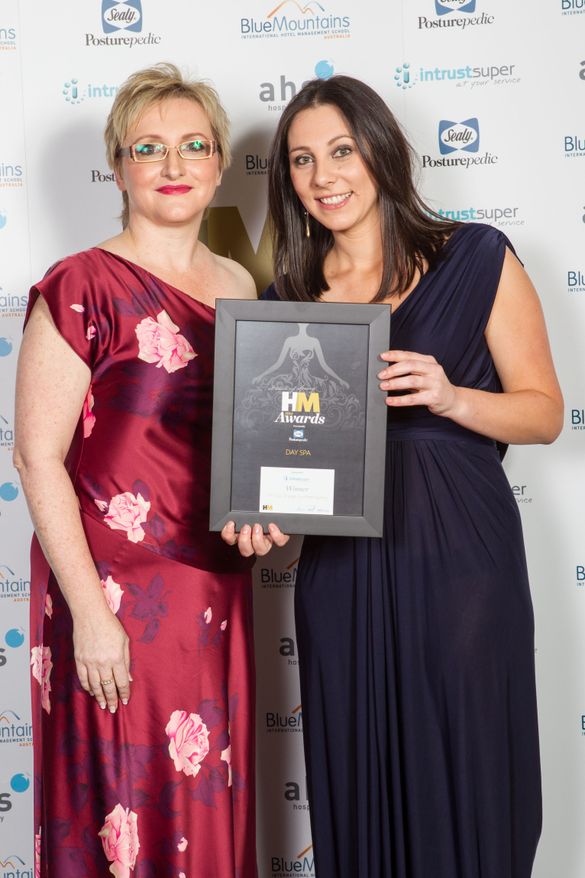 Chaniele Erasmuson, CHI spa manager accepts award for 'Best Day Spa'
