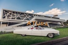 Atura Blacktown, proud new owner of a convertible 1960s Cadillac