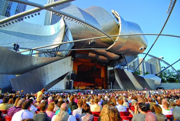 A crowd enjoys a free show at Jay Prtizker Pavilion in Millennium Park
