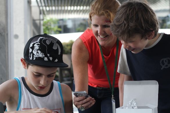 Archie & Luke playing with Bound Round as Janeece Keller (CEO, Bound Round) looks on