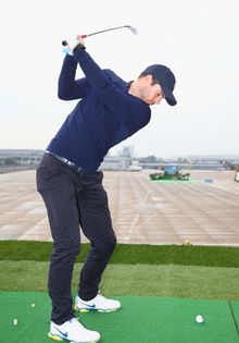Jamie Redknapp plays a shot from the wing of a British Airways Boeing 747