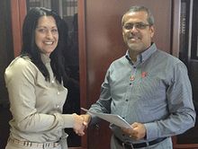 Melissa Storey, Executive Head of Strategy, Development and Marketing at First Car Rental, with Moustafa H. Khataw, the business