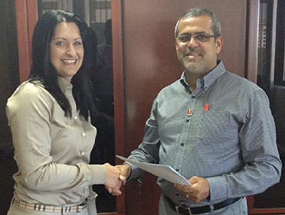 Melissa Storey, Executive Head of Strategy, Development and Marketing at First Car Rental, with Moustafa H. Khataw, the business