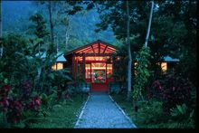 The Lodge at Pico Bonito's entrance at dusk