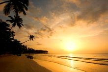 The sun sets on the beach at Sublime Samana