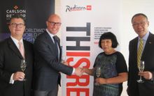 Thorsten Kirschke, president, Carlson Rezidor Hotel Group, Asia Pacific   with Mdm Lv Li Hua, of Shenyang New Times Investment C
