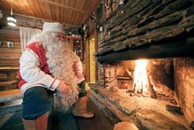 Father Christmas in cottage