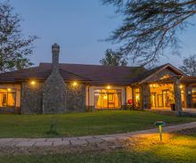 Night time at the chalets at Sweetwaters Camp
