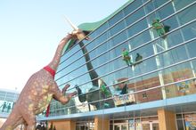 Elves rapelling four stories to meet Santa