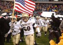 The Navy football team makes their way on to the field for America's Bowl Game in Philadelphia - the Army-Navy Game. 