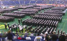 One of the most colorful and patriotic scenes surrounding the Army-Navy Game is the Brigade of Midshipmen marching onto Lincoln 