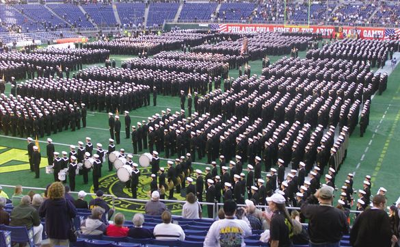 One of the most colorful and patriotic scenes surrounding the Army-Navy Game is the Brigade of Midshipmen marching onto Lincoln 