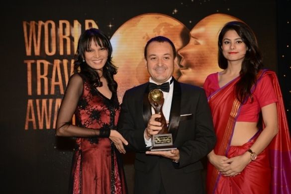 RIMBA's Director of Food & Beverage, Giordano Faggioli, receives the award for Asia's Leading New Hotel at the 2014 World Travel RIMBA's Director of Food & Beverage, Giordano Faggioli, receives the award for Asia's Leading New Hotel at the 2014 World Travel
