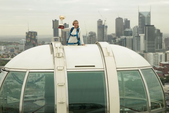 Edwina Bartholomew with the Emirates Melbourne Cup atop the Melbourne Star on Wednesday morning. Photo Credit: Getty Images