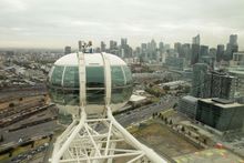 Edwina Bartholomew with the Emirates Melbourne Cup atop the Melbourne Star on Wednesday morning. Photo Credit: Getty Images