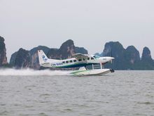 Seaplane landing on the water, Halong Bay