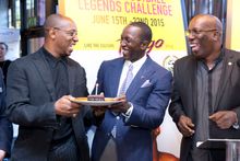 Ian Wright with the birthday boy Dwight Yorke and John Arnold, Events Co-ordinator THA