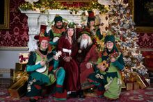 Father and Mother Christmas with the team of elves