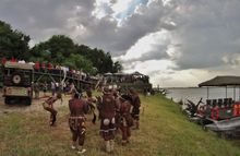 Crowds gather to witness the launch of the first electric game-drive boat and vehicle in Botswana.