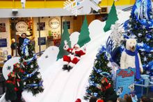 Santa takes a trip down the 47 foot long Yule Slide