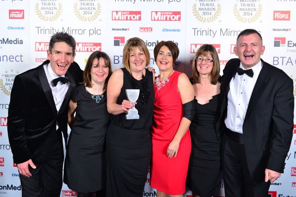 Celebrating their British Travel Award Win – Left to right: Andrew Jones, Director, Clare Levy, Marketing and Sales Manager, Kar