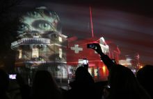 A light installation, created by Swiss light artist Gerry Hofstetter, is projected onto the Royal Observatory in Greenwich, Lond