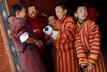 Bhutanese boys enjoying The Paro Tsechu Festiva, Bhutan
