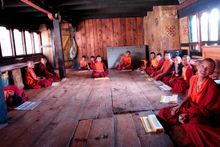 Buddhist monks reading holy texts, Bhutan