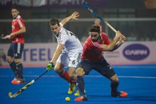 Nick Catlin in action for England against Germany in the Quarter Finals of the 2014 Champions Trophy.