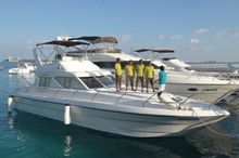Rizu with the male boat Captains at Kurumba, Maldives!