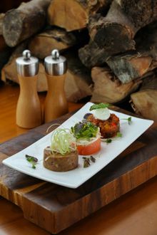 Cured salmon timbale, sicilian caponata, buffalo mozzarella, veal tartar, poached egg