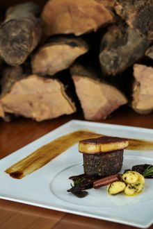 Charcoal grilled wagyu tenderloin, duck liver, winter black truffle, cinnamon potato gnocchi, morel mushroom sauce