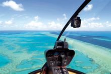 Take a scenic flight over the Great Barrier Reef