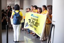 The Cebu Pacific team welcomes their 100 millionth passenger upon arrival