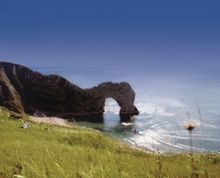 Natural limestone arch, the Durdle Door, on the jurassic coast near Lulworth, Dorset is part of the recommended walk near Parkde